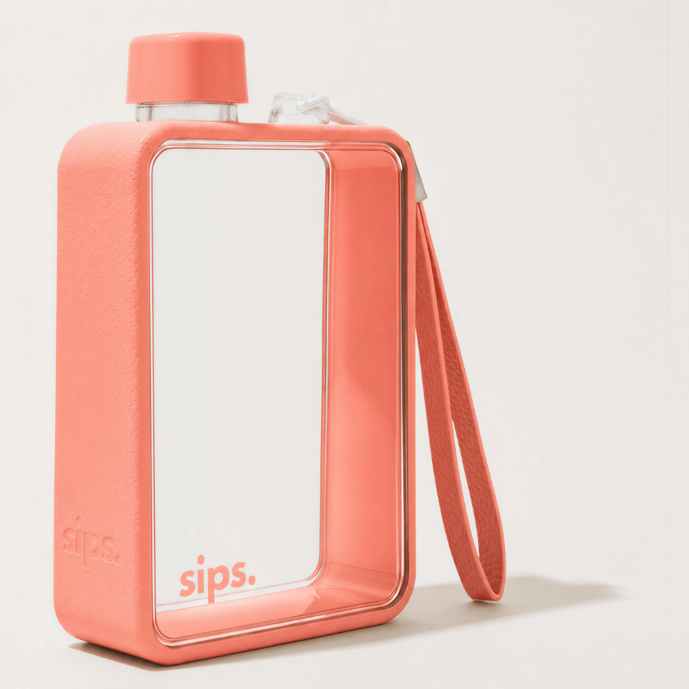 Sips Water Bottle in Coral on a plain background